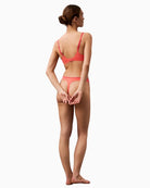 Back of violet Calvin Klein thong showing soft, seamless fabric