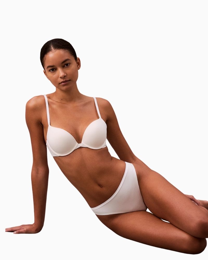 Calvin Klein Perfectly Fit Thong in white with tonal logo waistband and soft microfiber fabric