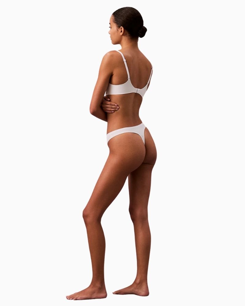 Side view of Calvin Klein Perfectly Fit Thong showing medium rise fit