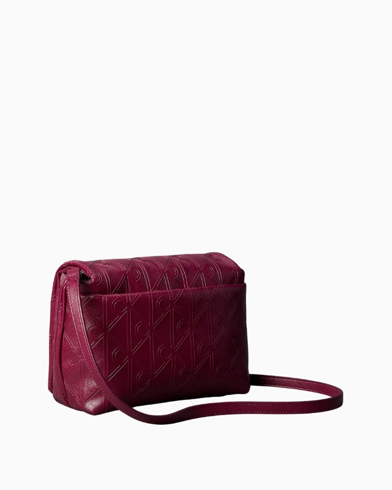 Calvin Klein Puffer Emblem Logo Flap Crossbody Bag side view – Áines Boutique