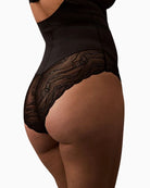 Back view Calvin Klein lace bodysuit with sheer lace cups, underwire support, and cut-out back