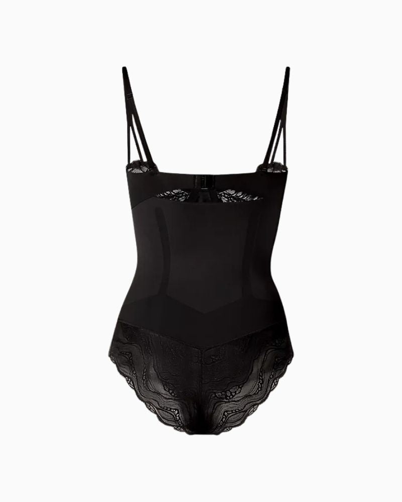 Back view of Calvin Klein bodysuit showing convertible straps and lace detail