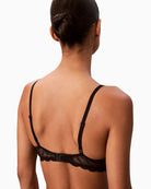 Close-up of lace texture and light padding in Calvin Klein bra