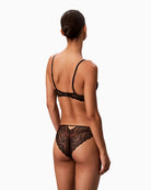 Back of Calvin Klein bra with adjustable straps and hook closure