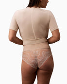 Back view of Calvin Klein Sensual Stretch Lace Shapewear Brief showing delicate lace detail