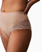 Close-up of Calvin Klein high-rise shapewear brief with scalloped lace trim