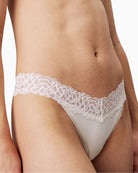 Calvin Klein Soft Stretch Lace thong in white with scalloped lace waistband