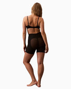 Back view of Calvin Klein no-show shapewear shorts with laser-cut edges
