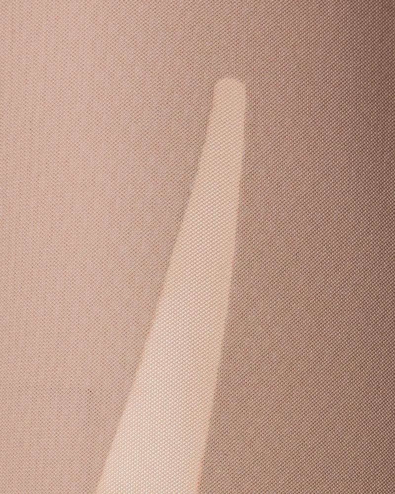 Close-up view of Stay Put Mesh shorts with laser cut edges and breathable mesh fabric