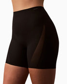 Close-up view of Calvin Klein shapewear shorts showing sculpting mesh panels