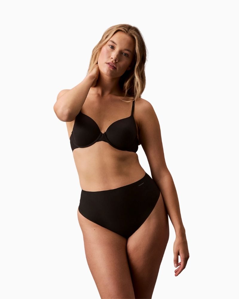 Calvin Klein Stay Put Mesh Sculpted Shapewear Thong in nude with high waist and laser cut edges