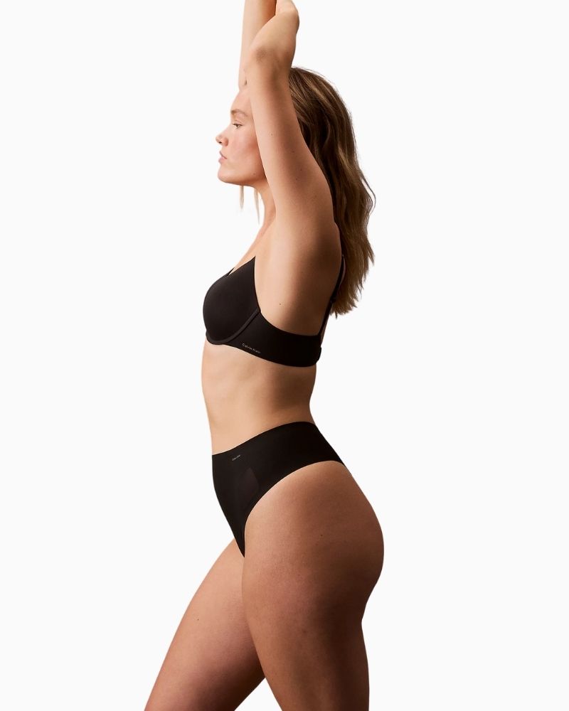 Side view of Calvin Klein Stay Put thong showing smooth, no-show finish