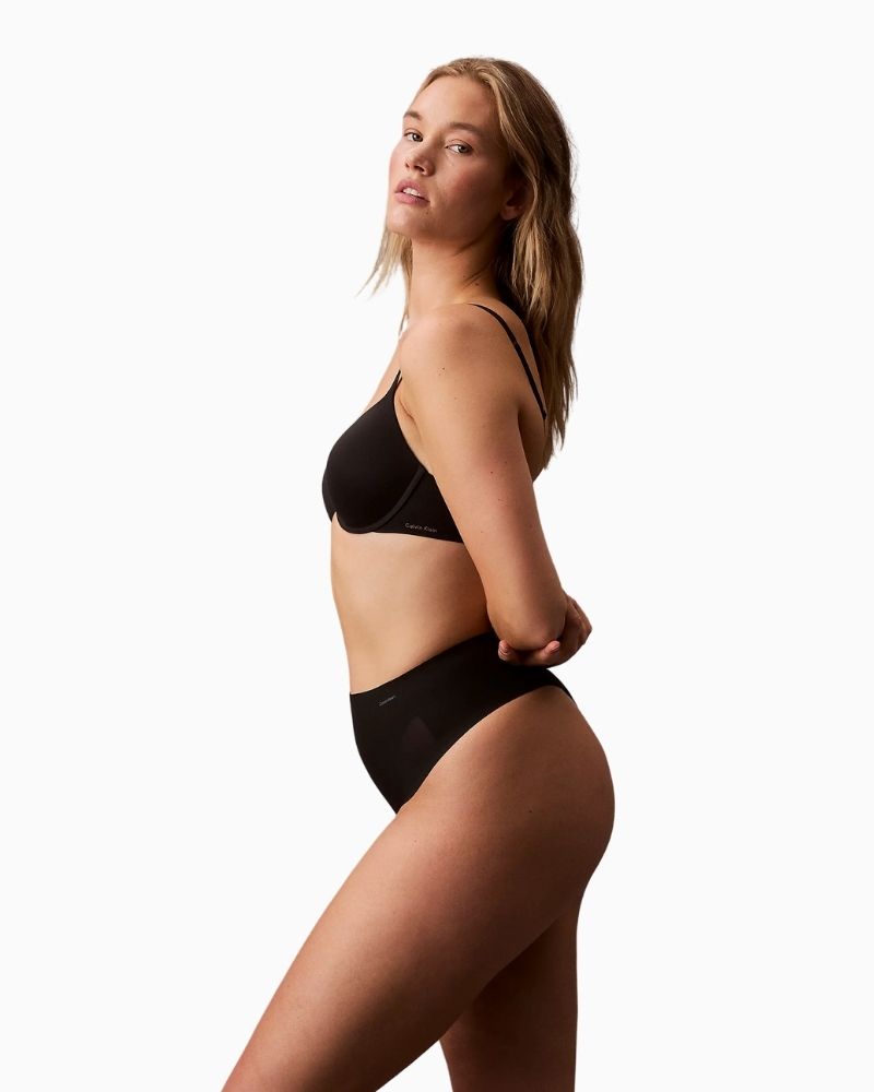 Side view of Calvin Klein Stay Put thong showing smooth, no-show finish