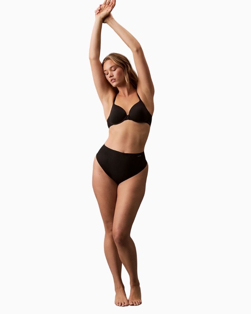 Calvin Klein Stay Put Mesh Sculpted Shapewear Thong in nude with high waist and laser cut edges