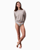 Front view of Calvin Klein grey sweatshirt showing relaxed fit and soft texture