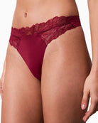 Close up of Calvin Klein pink thong with stretch waistband and smooth finish