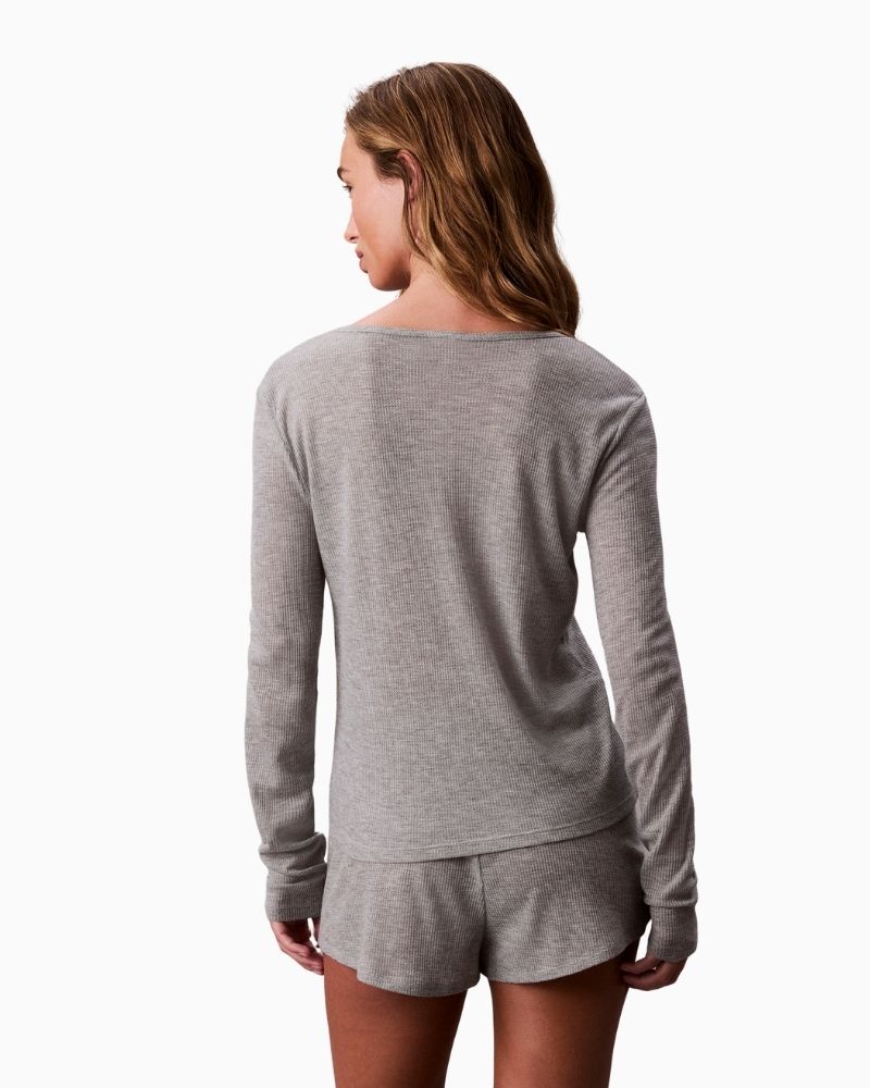 Back view of Calvin Klein grey waffle knit Henley top with long sleeves and button neckline