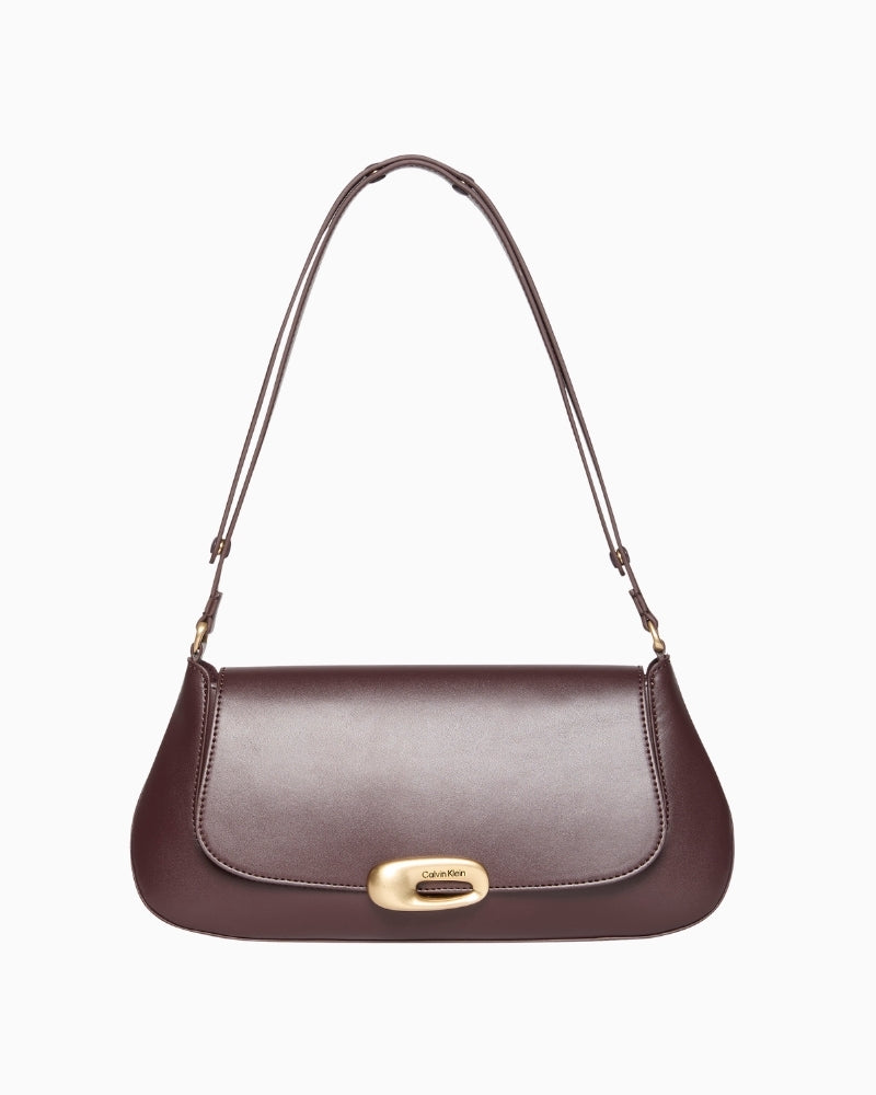 Front view of Calvin Klein top flap shoulder bag with smooth structured design