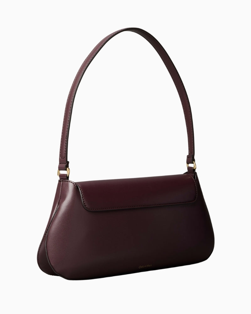 Side profile showing adjustable strap and clean seaming detail