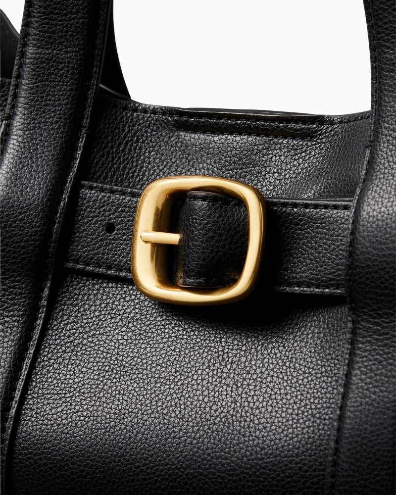 Close-up of webbing strap attachment and smart stitching on tote