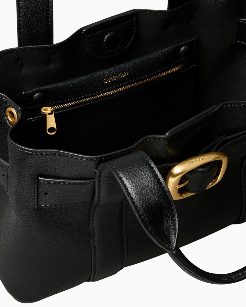 Close-up of webbing strap attachment and smart stitching on tote