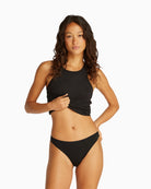 Model wearing black bikini briefs and matching bra front view