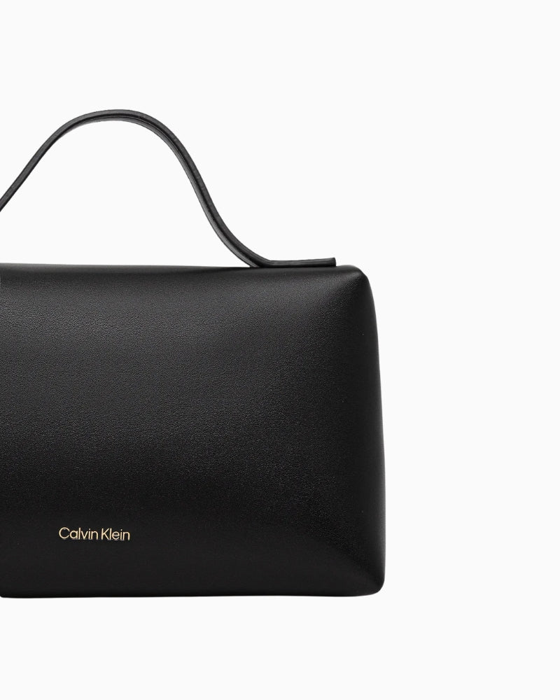 Back view of Calvin Klein black cosmetic bag – Áines Boutique