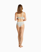 Back view showing adjustable straps and smooth band of Calvin Klein bra