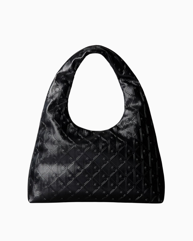 Calvin Klein puffer emblem logo shoulder bag, front view showing curved strap – Áines Boutique