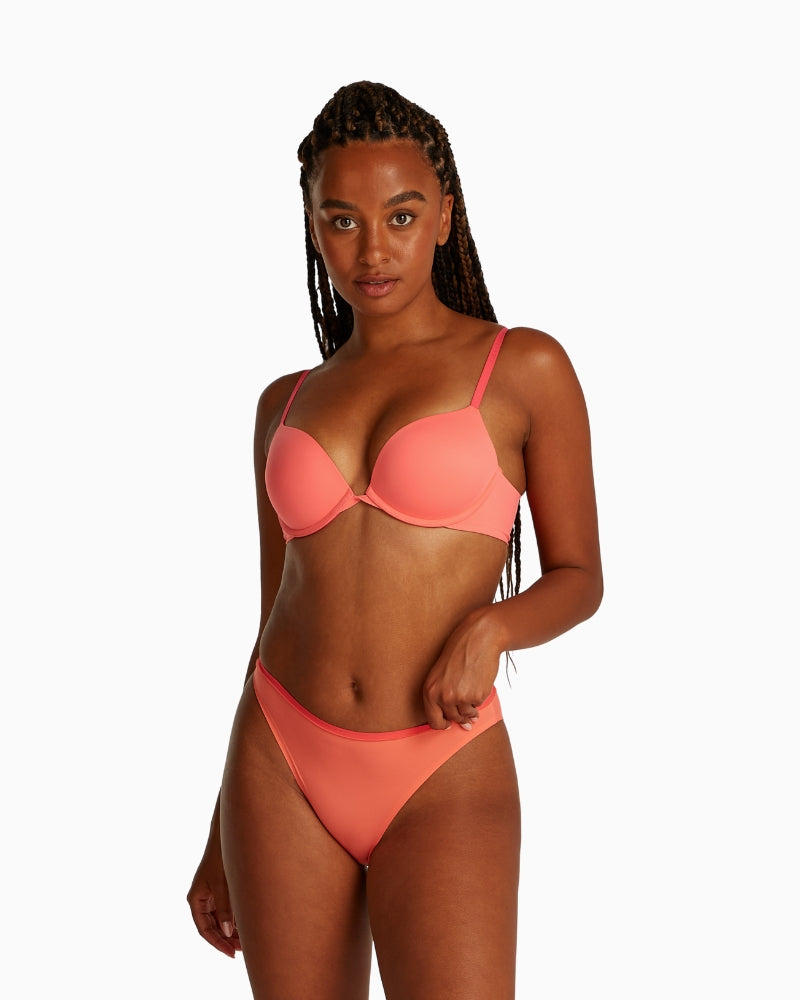 Side view of Calvin Klein padded plunge bra in soft recycled fabric