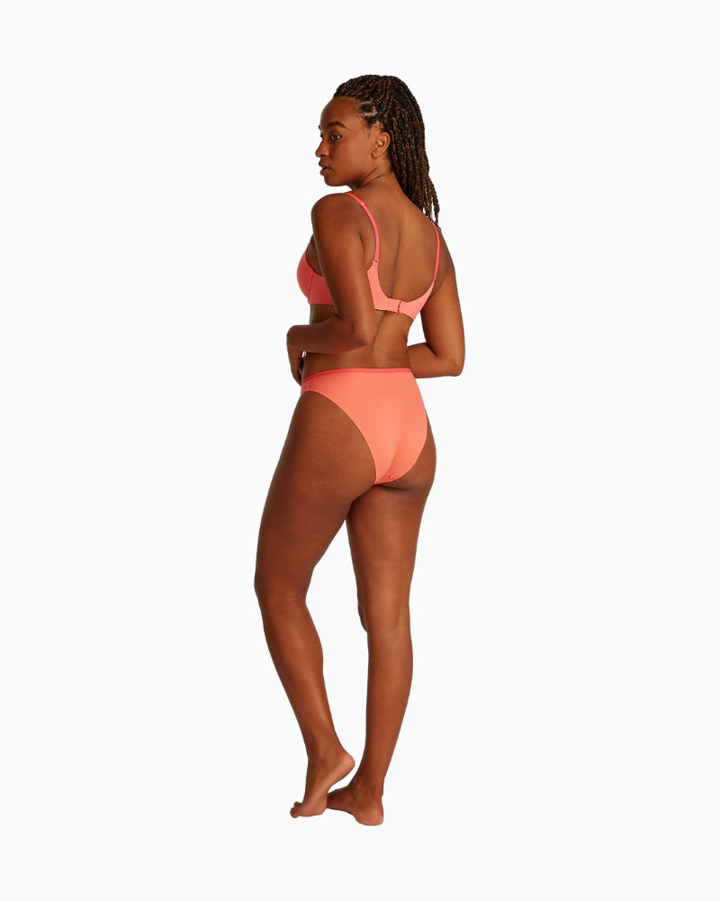 Back view showing adjustable straps and hook closure on exquisite pink bra