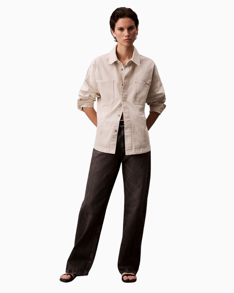 Calvin Klein 90s straight jeans in washed black rigid denim with mid-rise waist