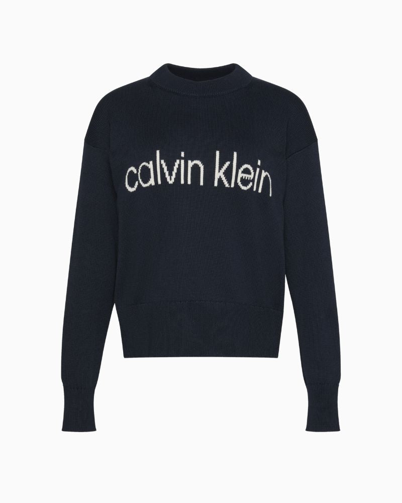 Front of CK graphic top styled with jeans for a relaxed everyday look