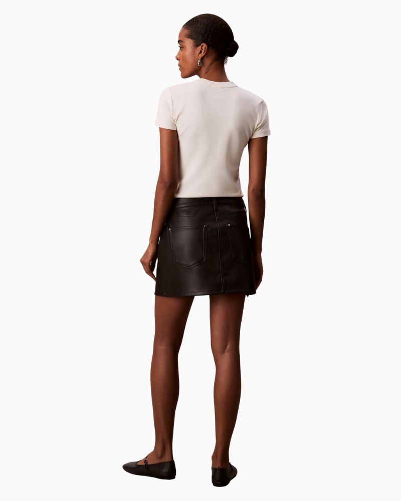 Back view of Calvin Klein vegan leather mini skirt showing classic pockets and fit