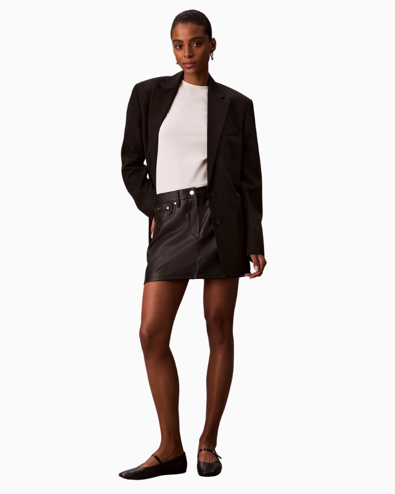 Calvin Klein faux leather black mini skirt with 5-pocket jeans-style design