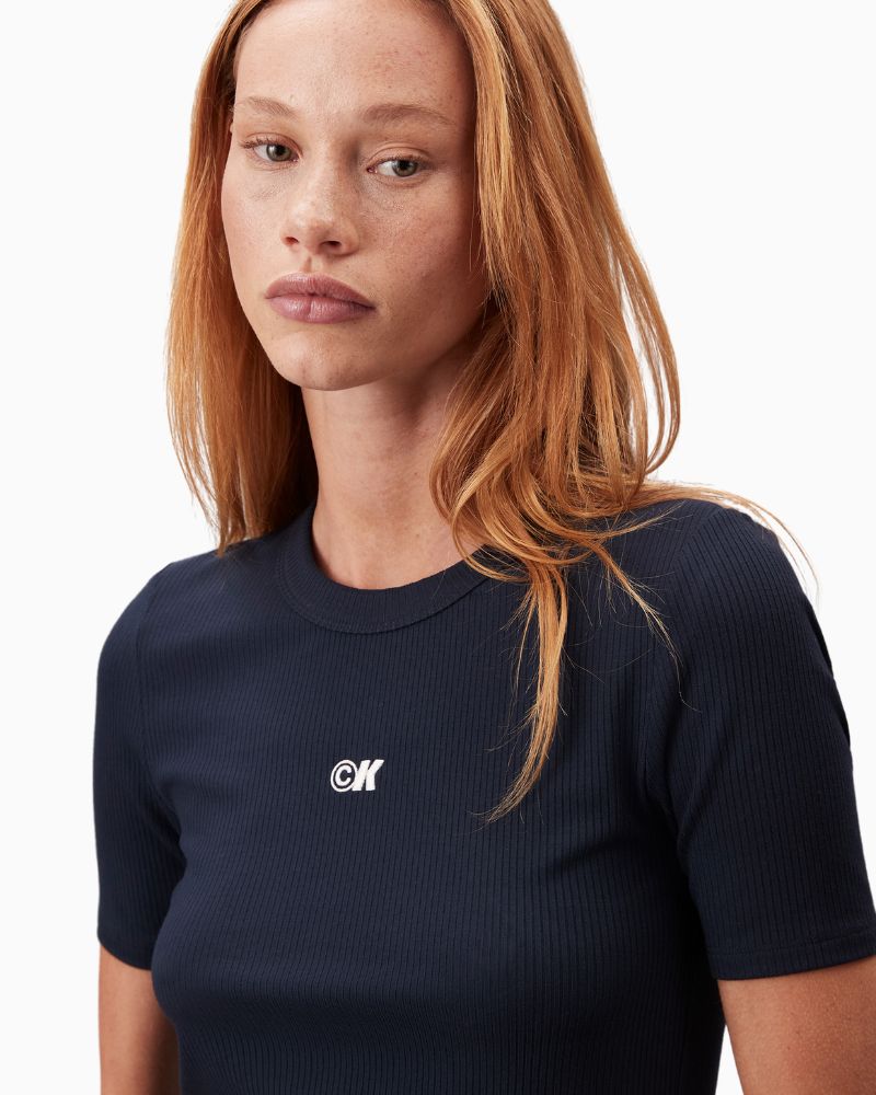 Close-up of rib knit fabric and Calvin Klein logo detail