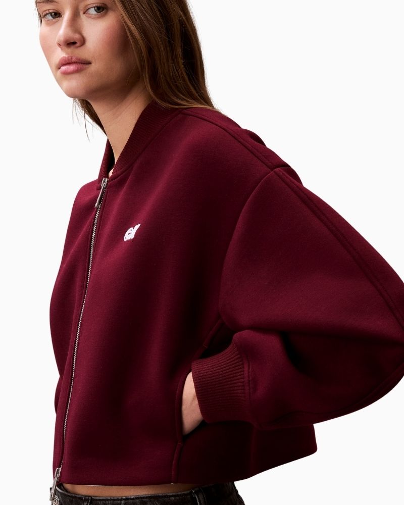 Close up view of oversized zip bomber with ribbed collar and cuffs