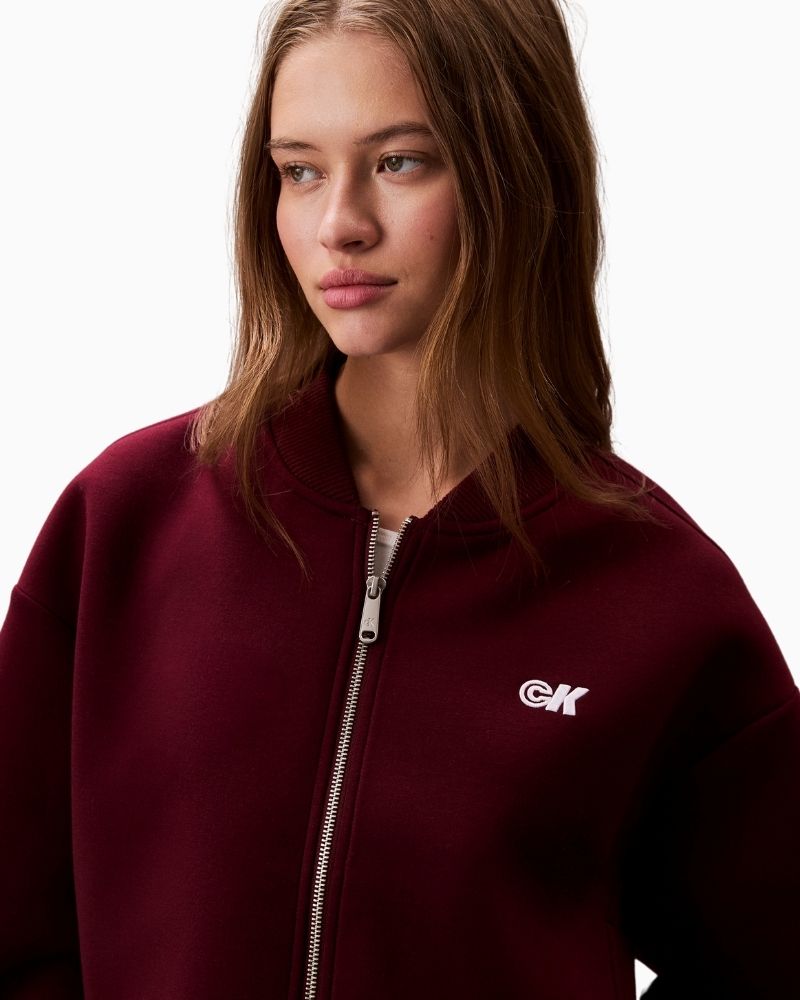 Close up view of oversized zip bomber with ribbed collar and cuffs