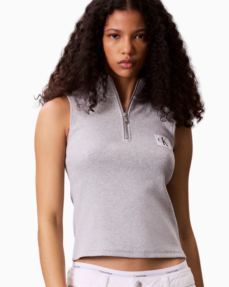 Close-up of Calvin Klein monogram label and fine rib texture