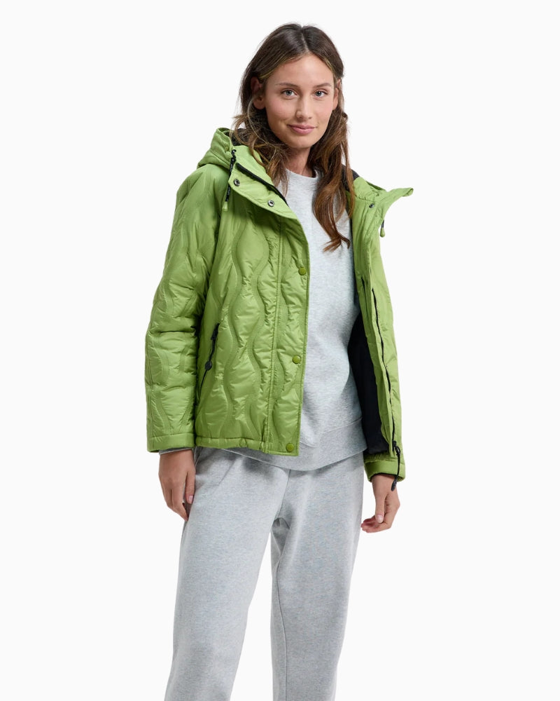 District Valmorel jacket in apple green paired with sweat pants