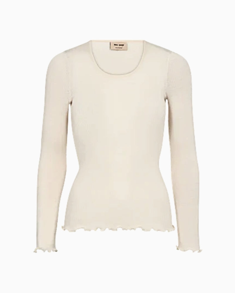 Front view of Mos Mosh Elaine Tee in ribbed wool-modal with ruffle hem