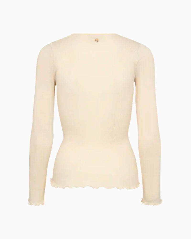 Back view of slim-fit long sleeve top in ecru