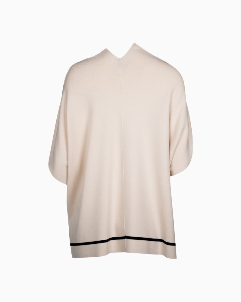 Back view of flowing cape with clean drape and bold edging