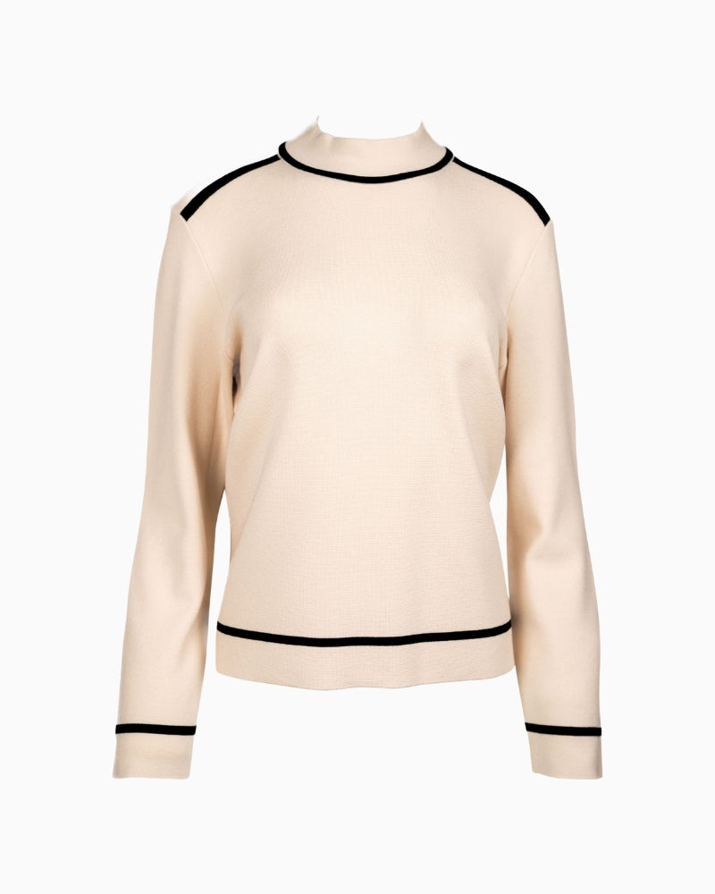 Front view of Faber cream sweater with black contrast trims and stand-up collar