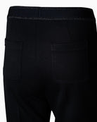 Close-up of stretch denim texture and zip fly on Levi’s Stellar Stretch skinny jeans