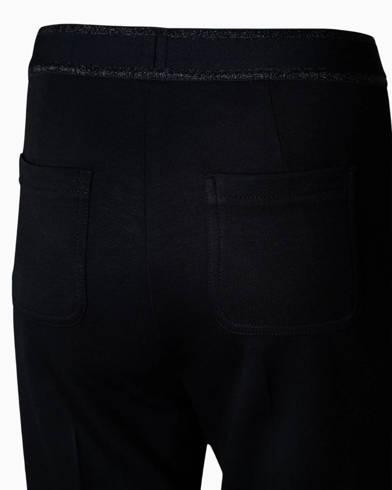 Close-up of stretch denim texture and zip fly on Levi’s Stellar Stretch skinny jeans