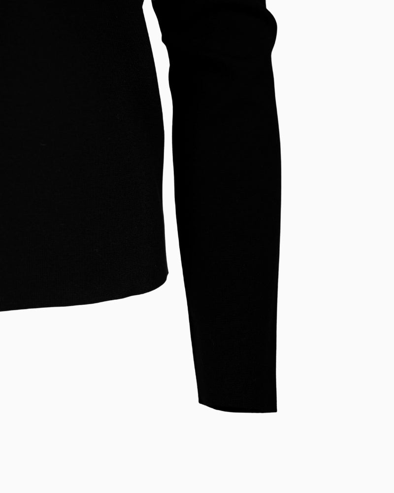 Close-up of sequin ribbon detail on Faber black turtleneck knit