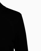 Close-up of sequin ribbon detail on Faber black turtleneck knit