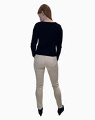 Back view of Faber cream trousers showing neat back pockets