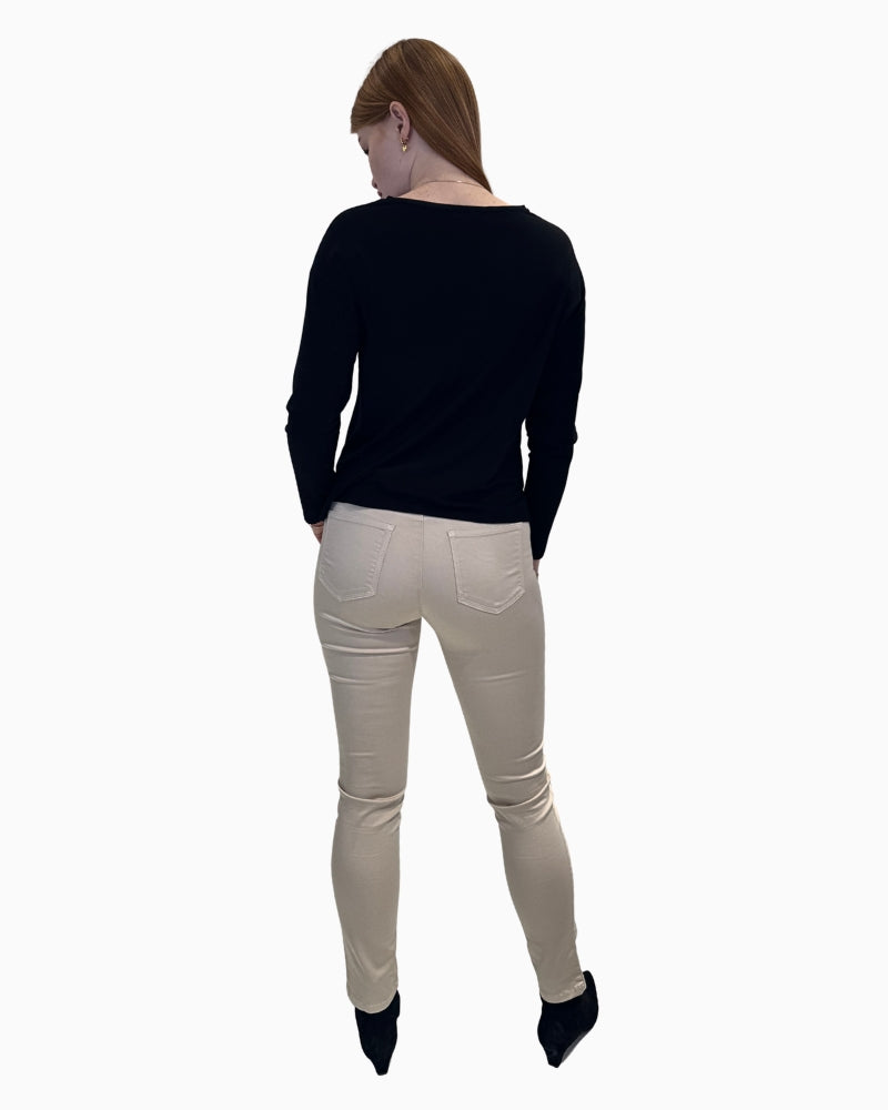 Back view of Faber cream trousers showing neat back pockets